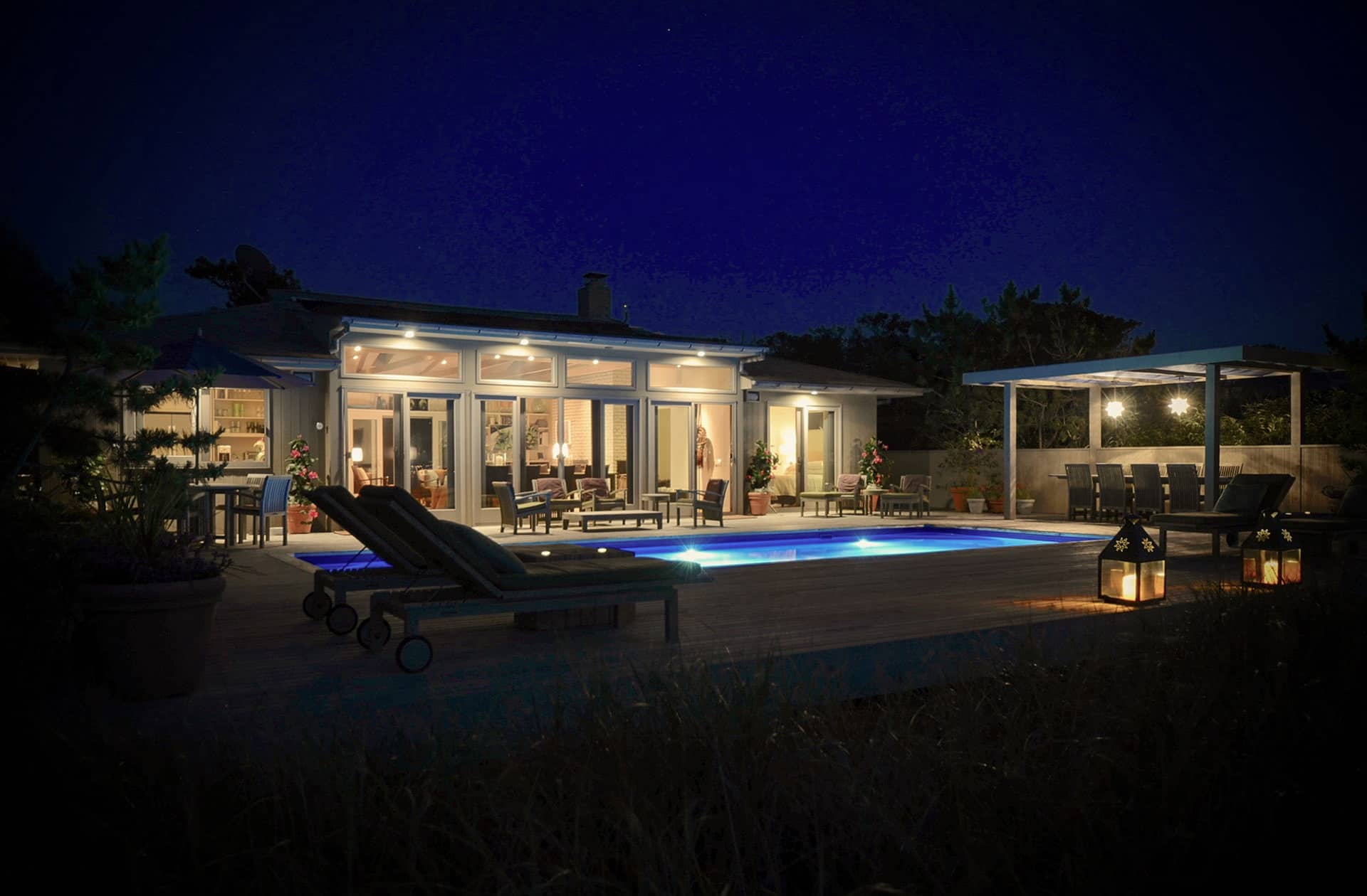 Pool and deck at night, Shore Walk Beach Home, Fire Island Pines | Rodman Paul Architects